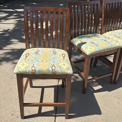 4 Barstools with upholstered seats