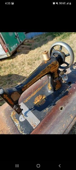 The Singer Manfg Co Sewing Machine
