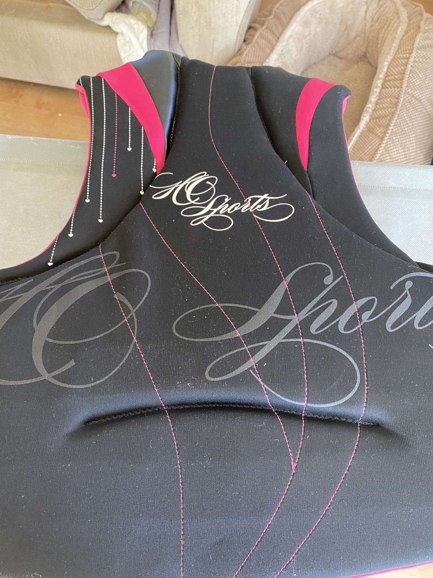 Woman’s Pink And Black Life Jacket 