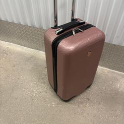 Joy Brand, hardshell  pink  luggage. Spinner 23 “ high   $50