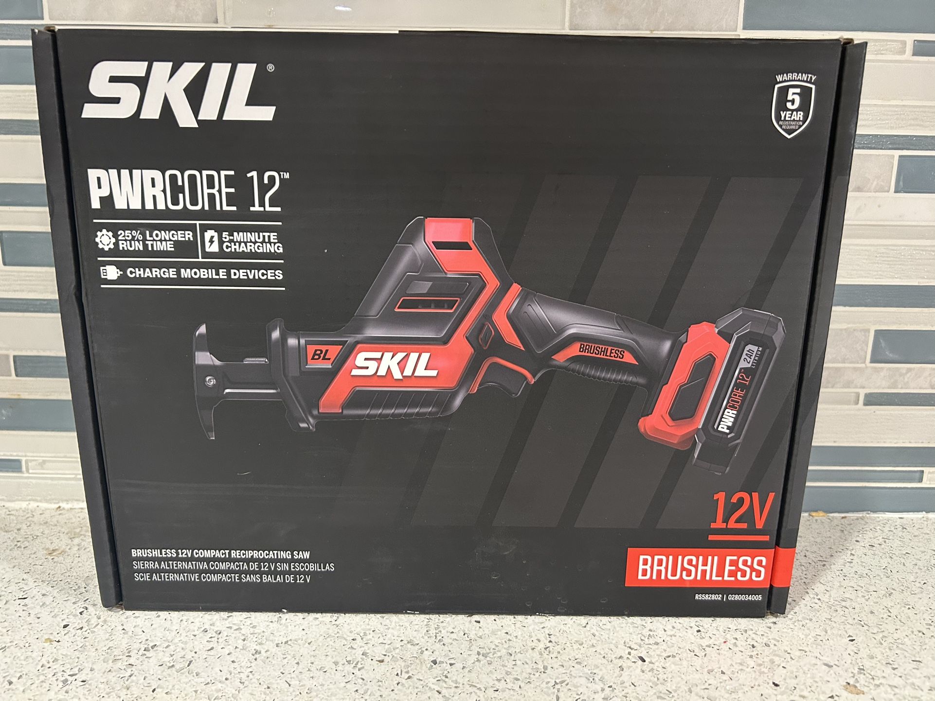 BRAND NEW SKIL 12-volt 2-Amp Variable Brushless Cordless Reciprocating Saw with Battery & Charger