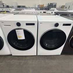 LG 4.5 cu. ft. Smart Front Load Washer & 7.4 cu. ft. Vented Stackable Gas Dryer 
