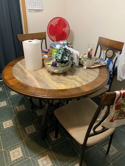 China cabinet with dining table with four chairs