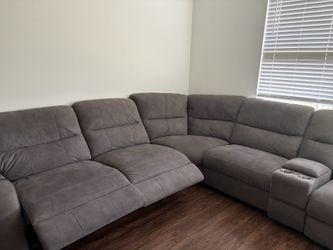 Grey sectional recliner