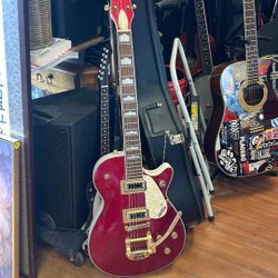 Gretsch Electromatic Pro Jet electric guitar, likely a G5431G model or similar in a vibrant red finish