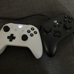 Two Xbox Controllers 
