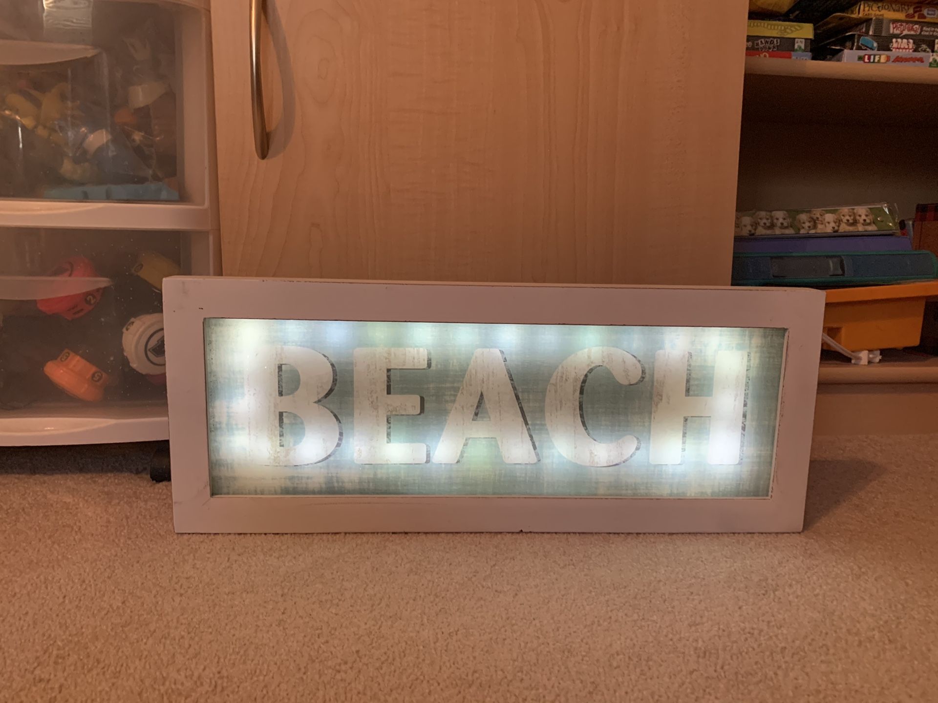 “BEACH” light-up sign