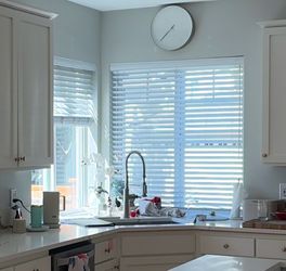 White wood Venetian blinds