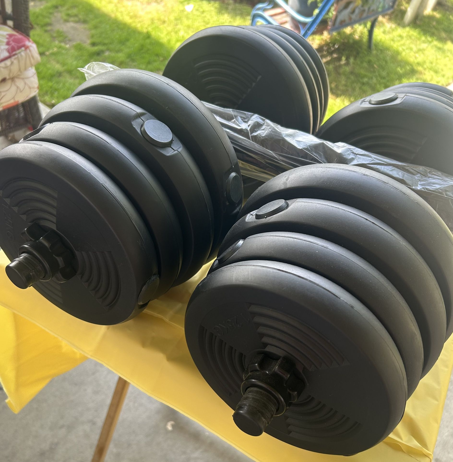 66 pounds dumbbells 33 pounds each also they come with an extra drop bar so you can work out your chest