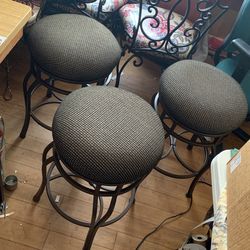 Set Of Three Metal Swivel Stools 