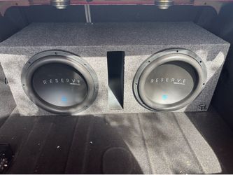 Dual 12” Soundstream Reserve subwoofers in a ported box with Asylum 700W mono amplifier.