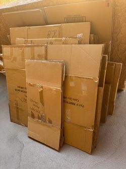 Assorted cardboard moving boxes