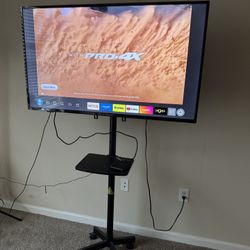 50 inch 4k tv with Rolling Stand $200 OBO