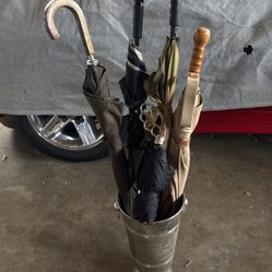 Umbrellas $5. Each. And Hold Also $5. 