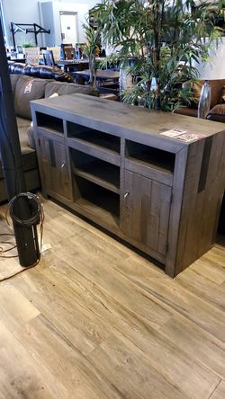 Beautiful solid wood TV stand available in Gray or brown also you can add fireplace