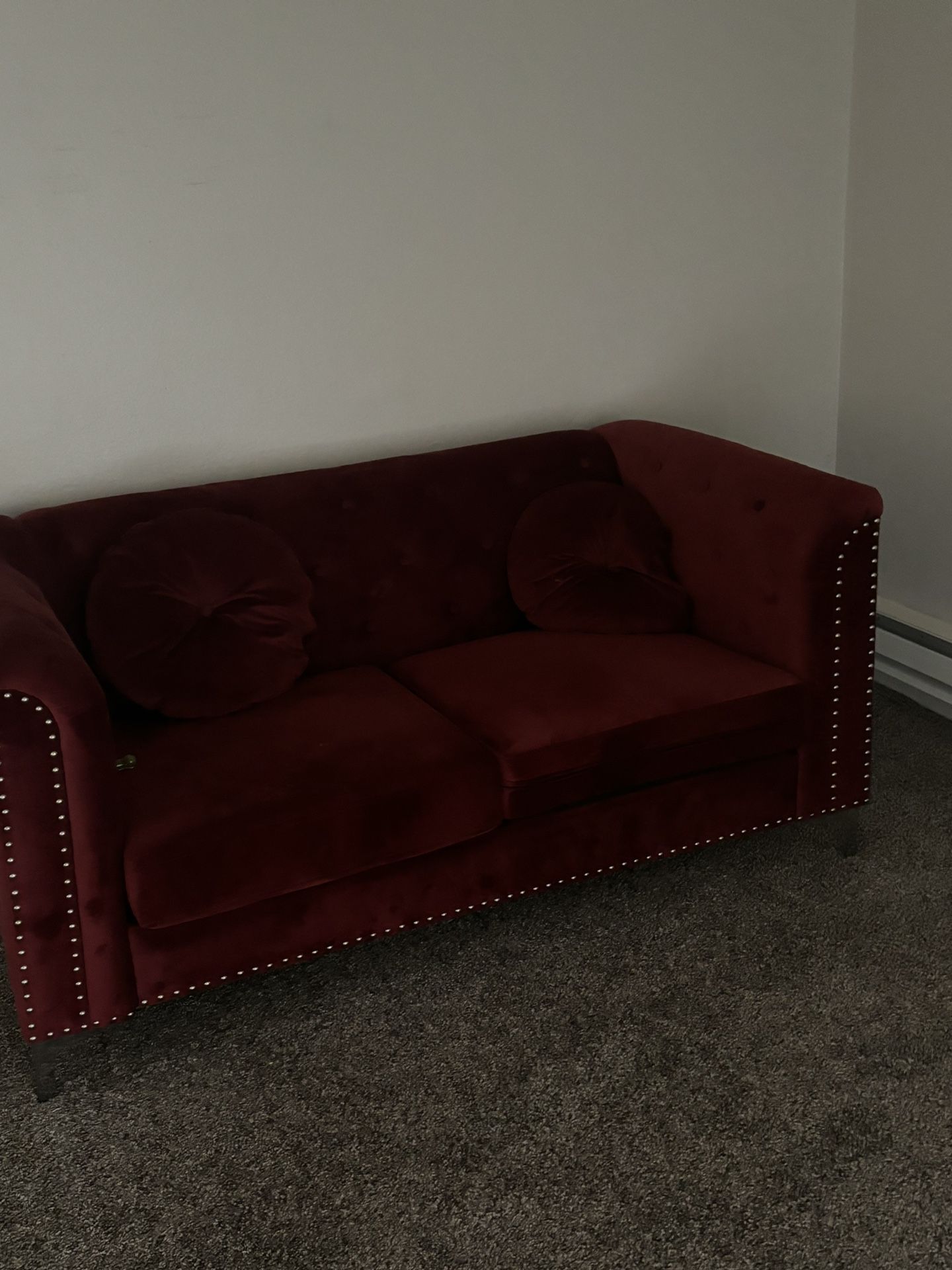 Good Condition Small Burgundy Couch With Pillows 