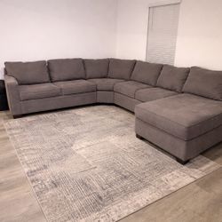 6 piece sectional and large rug 