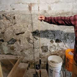 True Temper One Piece Fishing Rod With Vintage Penn Reel