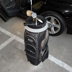 Golf Bag With 5 Assorted Clubs