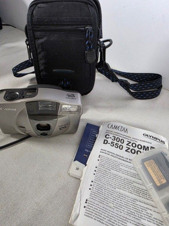 Canon Sure Shot Owl PF Date 35mm Film Camera. Color Silver and Black. For parts