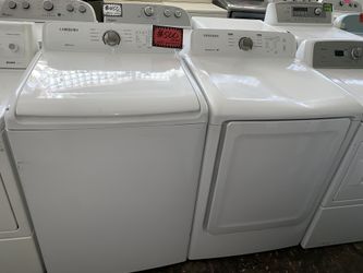 Samsung top lod washer(used) and new electric dryer working perfectly with 4 months warranty