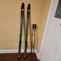 K2 Three all-mountain skis 177cm With Salomon Bindings And Poles