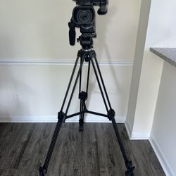 Professional-grade Panasonic AG-AC8 camcorder. 