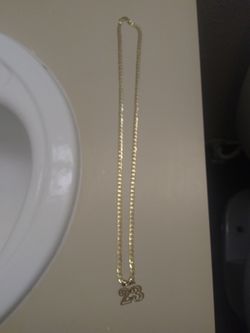 10 k gold chain and charm