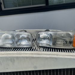 99-06 OEM SIERRA HEADLIGHTS 