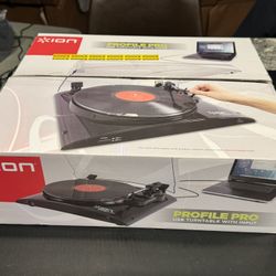 ION Audio Profile LP - Vinyl-Archiving USB Turntable. Not used! Platter rubber sealed. Needle covered! Broke hinge on dust cover while unboxing. All a