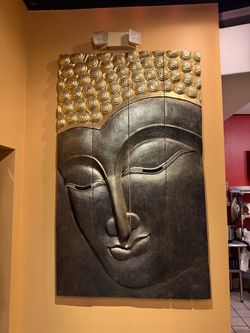 Wood Buddha face wall