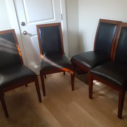 4 Leather And Wood Dining Room Chairs