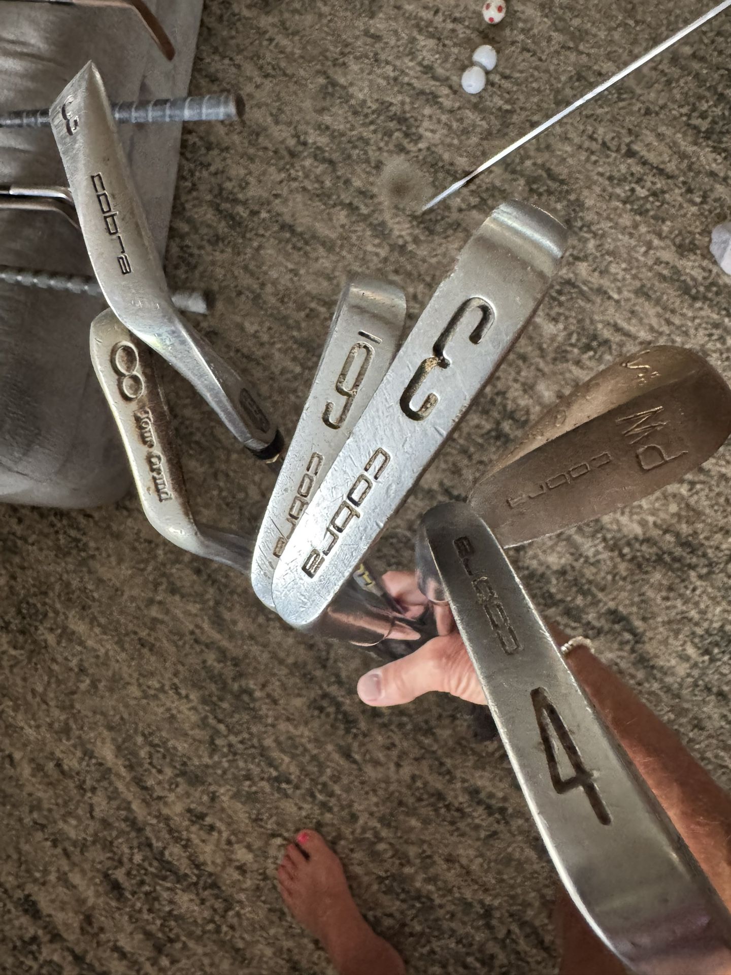 Assorted Golf Clubs