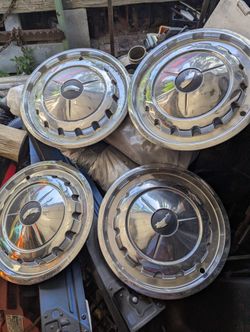 1(contact info removed) 1957 Hub Caps OEM