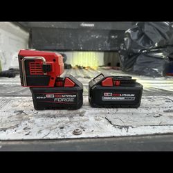 2 New Milwaukee Batteries And Plug 