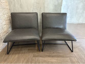 Two Dark Grey Leatherette Chairs