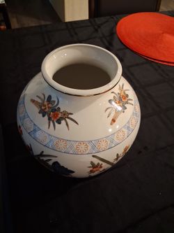 Vintage WBI hand-painted ceramic vase, which is a collectible piece featuring Asian Oriental floral and botanical motifs in blue, green, orange, and w