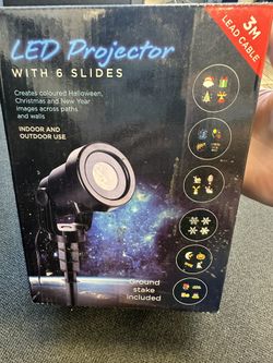 New !LED Projector With 6 Slides