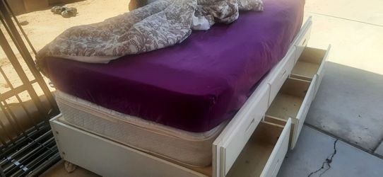 Nice twin bed with  Mattress  and botton dressed  asking  150 obo