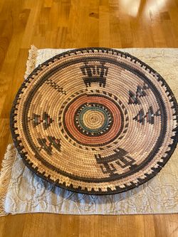 African vintage tribal woven basket. 12 inch. Wide x 3 inch deep. Gorgeous southwest decor accent.
