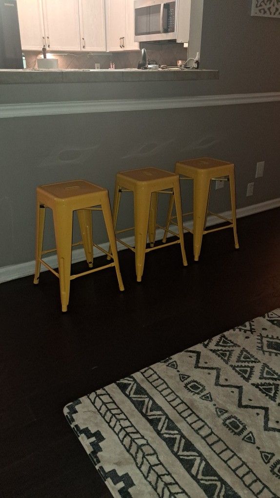 Set Of Three Yellow Metal Bar Stools⁸