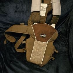 2 Baby Carriers Brown And Black. 