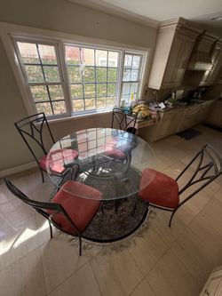 Glass round table with 4 chairs