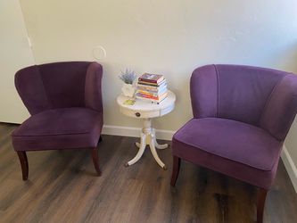 Living spaces Deep purple lounge chairs