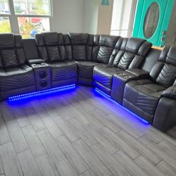 Brand New Power Reclining Sectional With Led Lights,  Speakers,  USB Ports, Cupholders,  2 Consoles And Arm Storage 