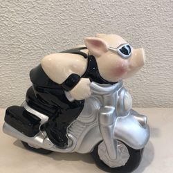 Pig Riding Motorcycle Ceramic Cookie Jar Approximately 9.50” Tall And 11” Wide  No chips or cracks, If you see it here , it is available.