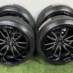 NEW 24x12 gloss black milled fuel wheels wrapped in arroyo 295/35r24 tires