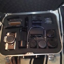 Minolta XD5  35 mm Camera with Several Assessories 