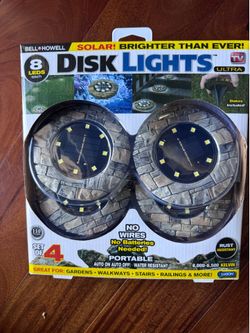 BELL + HOWELL 4-Pack Disk Lights Ultra 80 - Lumens Slate Solar Integrated LED Path Light with Dusk-to-Dawn Sen..