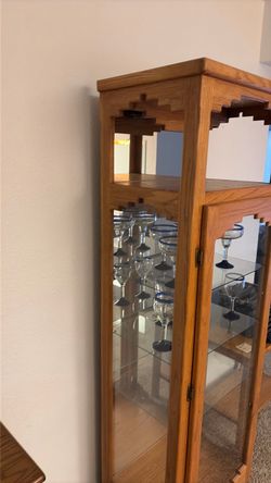 Oak curio with adjustable glass shelves